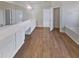 Double vanity bathroom with soaking tub and walk-in closet at 3905 Colonial Sw Trl, Lilburn, GA 30047