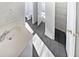 Bathroom with vanity, toilet and access to bedroom and closet at 3905 Colonial Sw Trl, Lilburn, GA 30047