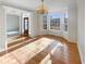 Elegant dining room with hardwood floors and crown molding at 3905 Colonial Sw Trl, Lilburn, GA 30047
