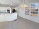 Kitchen with island, granite countertops, and stainless steel appliances at 3905 Colonial Sw Trl, Lilburn, GA 30047