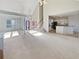 Open floor plan living room, kitchen and stairs at 3905 Colonial Sw Trl, Lilburn, GA 30047