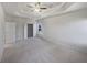 Spacious main bedroom with ample natural light and carpet flooring at 3905 Colonial Sw Trl, Lilburn, GA 30047
