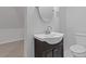 Simple bathroom with vanity and toilet at 1974 Browns Mill Se Rd, Atlanta, GA 30315