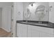 Double vanity bathroom with gray countertop and modern fixtures at 1974 Browns Mill Se Rd, Atlanta, GA 30315