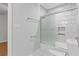 Clean bathroom with a shower/tub combo and white tile at 1974 Browns Mill Se Rd, Atlanta, GA 30315