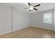 Spacious bedroom with light walls and wood-look floors at 1974 Browns Mill Se Rd, Atlanta, GA 30315