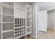 Large closet with built-in shelving and shoe storage at 1974 Browns Mill Se Rd, Atlanta, GA 30315