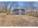 Newly renovated home with gray siding and landscaping at 1974 Browns Mill Se Rd, Atlanta, GA 30315