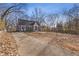 Cute gray house with a gravel driveway at 1974 Browns Mill Se Rd, Atlanta, GA 30315