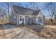 Updated home with gray exterior and a spacious yard at 1974 Browns Mill Se Rd, Atlanta, GA 30315