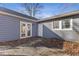 Rear exterior view showing a deck and grey house siding at 1974 Browns Mill Se Rd, Atlanta, GA 30315