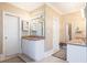 Double vanity bathroom with ample storage and modern fixtures at 63 Habersham Cove Nw Ln, Atlanta, GA 30305