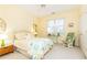 Charming bedroom with queen bed and rocking chair at 63 Habersham Cove Nw Ln, Atlanta, GA 30305
