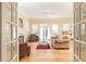 Gathering room with access to the kitchen and backyard at 63 Habersham Cove Nw Ln, Atlanta, GA 30305