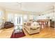 Open concept Gathering room and kitchen with hardwood floors at 63 Habersham Cove Nw Ln, Atlanta, GA 30305