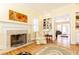 Living room with fireplace and built-in shelving at 63 Habersham Cove Nw Ln, Atlanta, GA 30305
