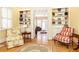Living room with built-in shelving and French doors at 63 Habersham Cove Nw Ln, Atlanta, GA 30305