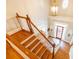 Grand staircase with hardwood treads and white railings at 63 Habersham Cove Nw Ln, Atlanta, GA 30305