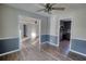 Dining room with hardwood floors and views of living room and kitchen at 758 Shoreline Se Trl, Conyers, GA 30094