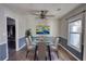 Formal dining room with glass table and six chairs at 758 Shoreline Se Trl, Conyers, GA 30094