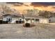 Ranch home with front porch, attached garage, and well-manicured lawn at 758 Shoreline Se Trl, Conyers, GA 30094