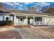 House exterior featuring a covered porch and landscaping at 758 Shoreline Se Trl, Conyers, GA 30094