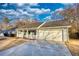 Ranch home with attached garage and large front yard at 758 Shoreline Se Trl, Conyers, GA 30094