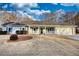 Ranch style home with a covered porch and attached garage at 758 Shoreline Se Trl, Conyers, GA 30094