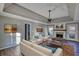 Spacious living room with fireplace, high ceilings and hardwood floors at 758 Shoreline Se Trl, Conyers, GA 30094