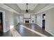 Living area with hardwood floors, fireplace, and high ceilings at 758 Shoreline Se Trl, Conyers, GA 30094