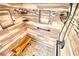Walk-in shower with tiled walls and built-in shelves at 758 Shoreline Se Trl, Conyers, GA 30094