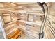 Walk-in shower with tiled walls and built-in shelves at 758 Shoreline Se Trl, Conyers, GA 30094