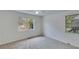 Spacious bedroom with neutral carpeting and large windows at 2843 Merritt Dr, Buford, GA 30518