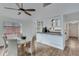 Kitchen and dining area with hardwood floors at 2843 Merritt Dr, Buford, GA 30518
