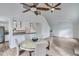 Bright dining area with hardwood floors and a charming round table at 2843 Merritt Dr, Buford, GA 30518