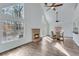 Spacious living room featuring a fireplace and hardwood floors at 2843 Merritt Dr, Buford, GA 30518