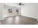 Bright living room featuring stylish flooring, modern windows and neutral color scheme at 1126 Williamsburg Ln, Norcross, GA 30093