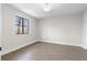 Bright room with recessed lighting, neutral walls, and modern flooring at 1126 Williamsburg Ln, Norcross, GA 30093