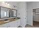 Double vanity bathroom with granite countertop at 149 Elkins Blvd, Locust Grove, GA 30248