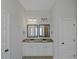 Double vanity bathroom with granite countertop at 149 Elkins Blvd, Locust Grove, GA 30248