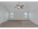 Large bedroom with ceiling fan and carpet at 149 Elkins Blvd, Locust Grove, GA 30248