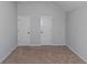 Spacious bedroom with two closets and neutral decor at 149 Elkins Blvd, Locust Grove, GA 30248