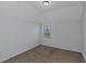 Bright bedroom with window and neutral decor at 149 Elkins Blvd, Locust Grove, GA 30248