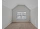 Bright bedroom with large window and neutral decor at 149 Elkins Blvd, Locust Grove, GA 30248