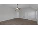 Large bedroom with ceiling fan and carpet at 149 Elkins Blvd, Locust Grove, GA 30248