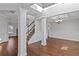 Formal dining room with hardwood floors, crown molding, and a chandelier at 149 Elkins Blvd, Locust Grove, GA 30248