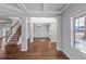 Bright dining room with hardwood floors and coffered ceiling at 149 Elkins Blvd, Locust Grove, GA 30248