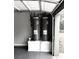 Garage with two tankless water heaters at 149 Elkins Blvd, Locust Grove, GA 30248