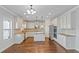 Spacious kitchen with white cabinets and granite countertops at 149 Elkins Blvd, Locust Grove, GA 30248