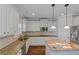 Modern kitchen with island and stainless steel appliances at 149 Elkins Blvd, Locust Grove, GA 30248
